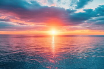 Naklejka premium Vibrant Sunset Over Ocean Wall Art for Home Decor and Relaxing Ambiance
