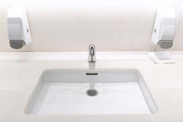 Washbasin and faucet in new bathroom.