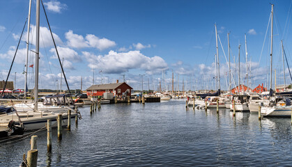 Obraz premium Scenic Marina with Boats Docked Under a Clear Blue Sky on a Sunny Day, Faaborg, Denmark