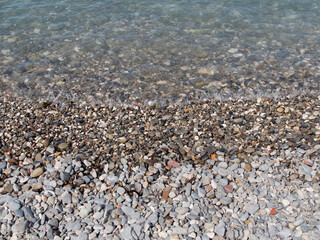 Pebbles on the beach. Menton, French Riviera, France
