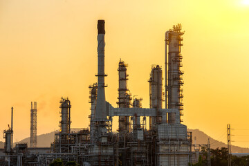 Oil Refinery factory at sunrise.