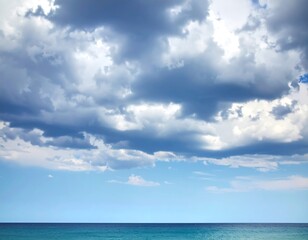 Fototapeta premium Cloudy sky meeting the ocean