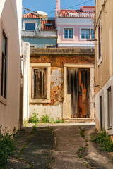 Worn and well used entryway in Lisbon, Portugal