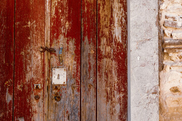 Worn wooden door and hardware in Lisbon, Portugal