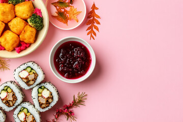 Sushi and Cranberry Sauce on Pink Background