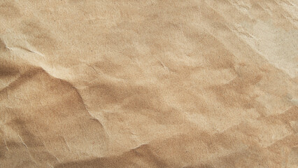 Vintage paper texture background. Crinkled brown paper. Rumpled paper background for your graphic design ideas.