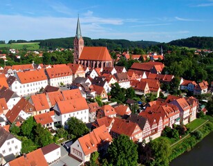 Aerial view of a European town with red-tiled roofs