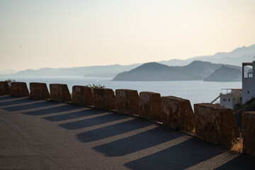 Concrete roadside barrier overlooking Mediterranean sea in Benidorm