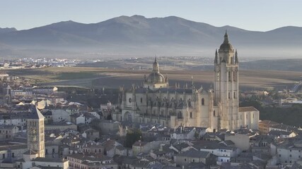 Aerial view of segovia cathedral surrounded by beautiful rooftops and historic buildings, segovia, segovia, spain.