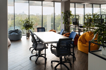 Modern coworking office interior with panoramic city view featuring Saint Isaac's Cathedral