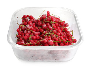 Frozen currants in glass container isolated on white