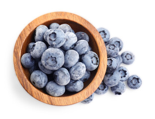 Many frozen blueberries in bowl isolated on white, top view