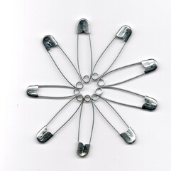
A set of silver safety pins.