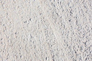 White concrete texture with a natural pattern for the background. Perfect for the background of repair shops and repair services
