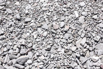 stone wall texture. Pebble grey stone texture backgroud. Ideal for backgrounds, textures, and construction-related