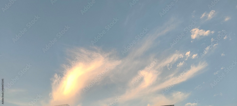 Canvas Prints twilight sky with wispy cirrus clouds in golden-blue gradient, soft translucent light.