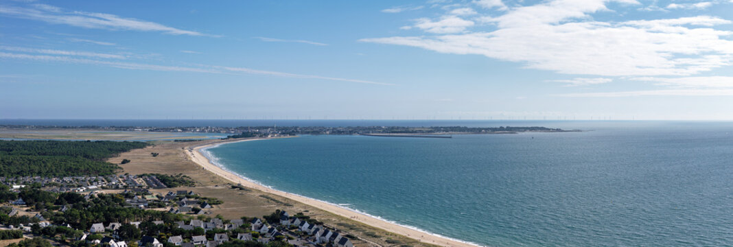 Panorama of La Turballe with Pen Bron and Le Croisic with sea in the Guerande peninsula, Brittany, France, drone photo