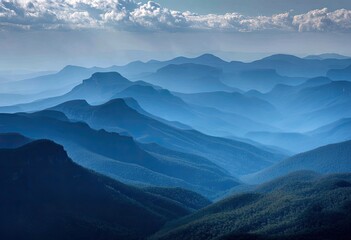 Obraz premium Misty mountain ranges, painted in shades of blue