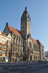Berlin, Germany. Front view of the Sozialamt Charlottenburg-Wilmersdorf administrative building with its distinctive stone facade and central tower