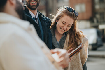 A cheerful gathering of friends outdoors, enjoying the warm day, laughing and bonding together in a relaxed atmosphere, radiating happiness and camaraderie.