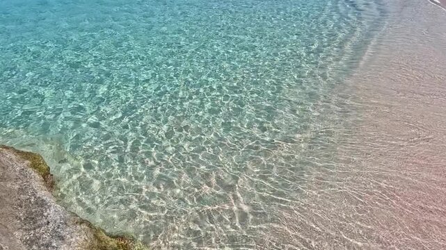 Formentera, Ses Illetes beach with rippling crystal water