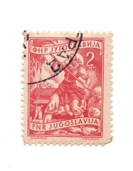 A vintage postage stamp from Yugoslavia isolated on a white background.
