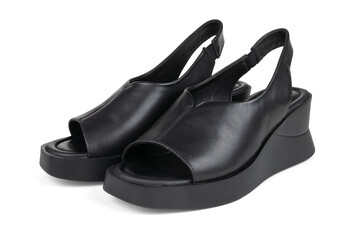 Stylish Black Leather Open-Toe Wedge Sandals for Modern Fashion. Transparent background.