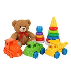 Childrens toys including teddy bear and stacking rings isolated on transparent background