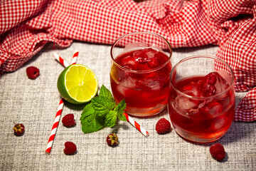 Colorful fruit drink in rustic styling with summer light and fresh ingredients.