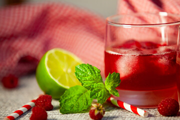 Lime and mint mocktail in soft natural light - clean and minimal summer refreshment.