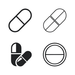 Four simple black and white icons of pills and capsules medicine health