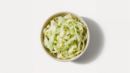 Sauerkraut Served in a Bowl Against a White Backdrop