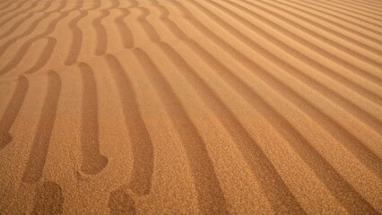Naklejka premium Close-up view of desert sand dunes texture