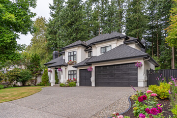 Two story luxury house with beautiful summer  landscape in Vancouver, Canada, North America. Day time on August 2025.