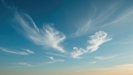 Vivid azure sky with light cloud patches