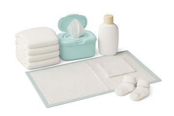 Baby hygiene accessories lying on changing mat with transparent background