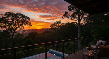 Luxurious jungle retreat balcony with a private pool overlooking a breathtaking tropical sunset.