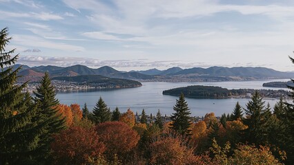Gorgeous fall landscapes featuring colorful trees and serene waters along a scenic beach in a northern coastal area.