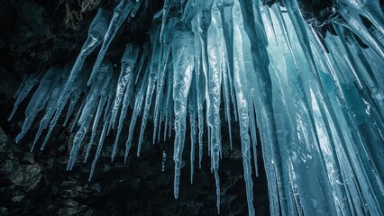 Within the grotto, ice stalactites hang elegantly, presenting an awe-inspiring scene that highlights the extraordinary charm of the cold season.