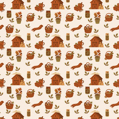 A seamless autumn-themed pattern featuring barns, baskets of mushrooms, jars, scarves, leaves, and potted plants in warm earthy tones.
