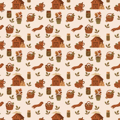 A seamless autumn-themed pattern featuring barns, baskets of mushrooms, jars, scarves, leaves, and potted plants in warm earthy tones.