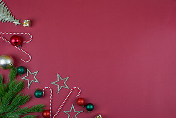 Bright and Festive Christmas Decorations are Beautifully Displayed on a Vibrant Red Background