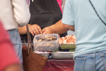 Hands Preparing Fresh Seafood Delicacies