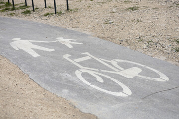 Cyclist and pedestrian route zone on a street. Painted Street Asphalt Bicycle Lane Sign White...
