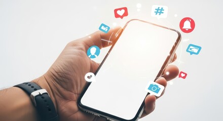 A hand holds a smartphone displaying social media icons and notifications.