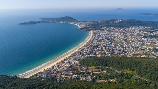 Aerial view of Mariscal beach with Morro do Macaco in the background, Santa Catarina, Brazil.
