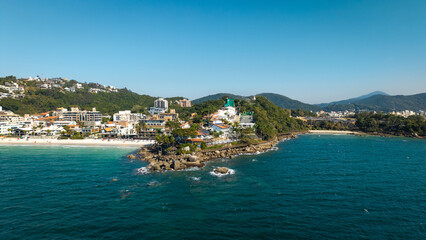 Fototapeta premium Aerial view of Praia do Ribeiro and surrounding area in Bombas, Santa Catarina, Brazil.