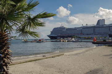 Modern luxury cruiseship cruise ship liner Koningsdam, Nieuw Statendam or Rotterdam in port of Oranjestad, Aruba ABC Islands tropical paradise during Caribbean dream vacation cruising