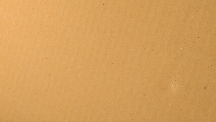 Background of brown kraft paper or cardboard texture. Brown recycled paper texture background.