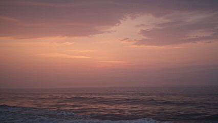 Fototapeta premium Scenic ocean scene bathed in sunrise glow